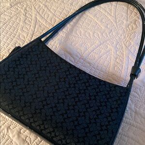 Coach Black Textured Shoulder Bag with Crescent Shape